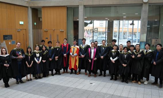 MSc graduation group photo in Bayes atrium