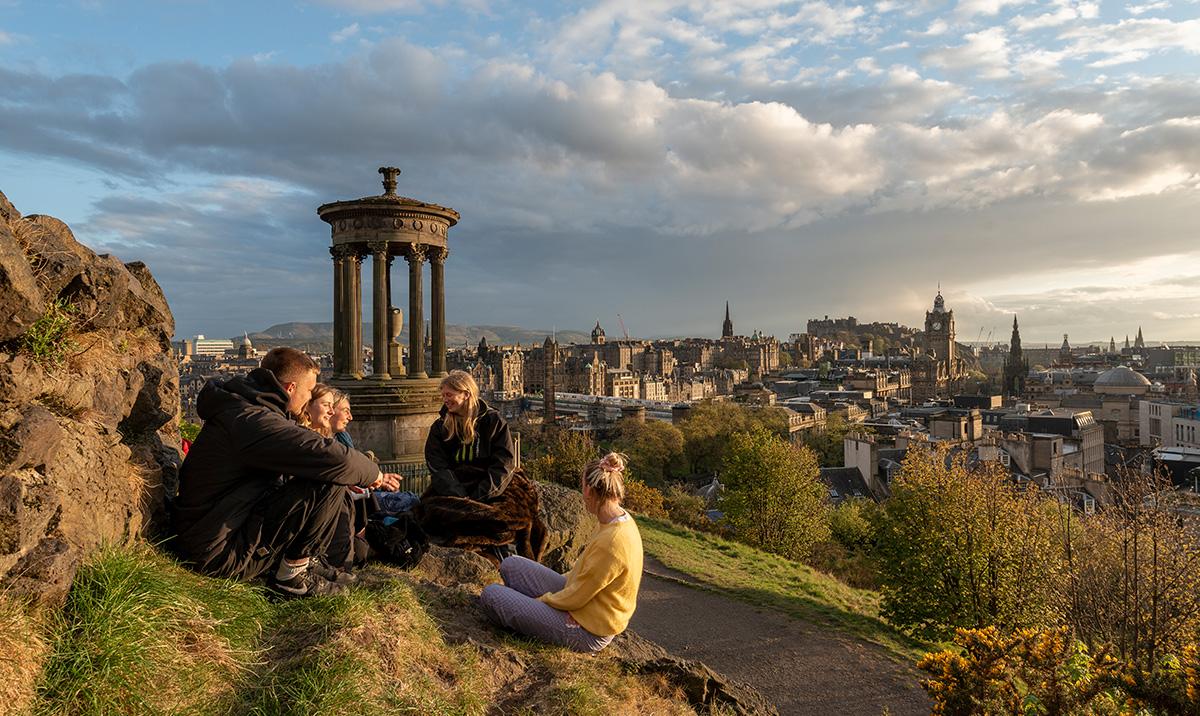 Photo by Chris Close shows students on Calton Hill overlooking city of Edinburgh 