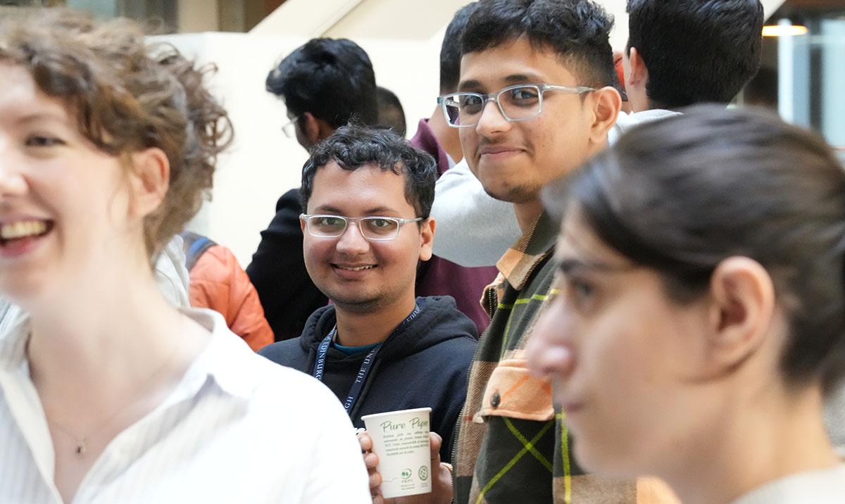 Students at Welcome Week reception in Bayes Centre.