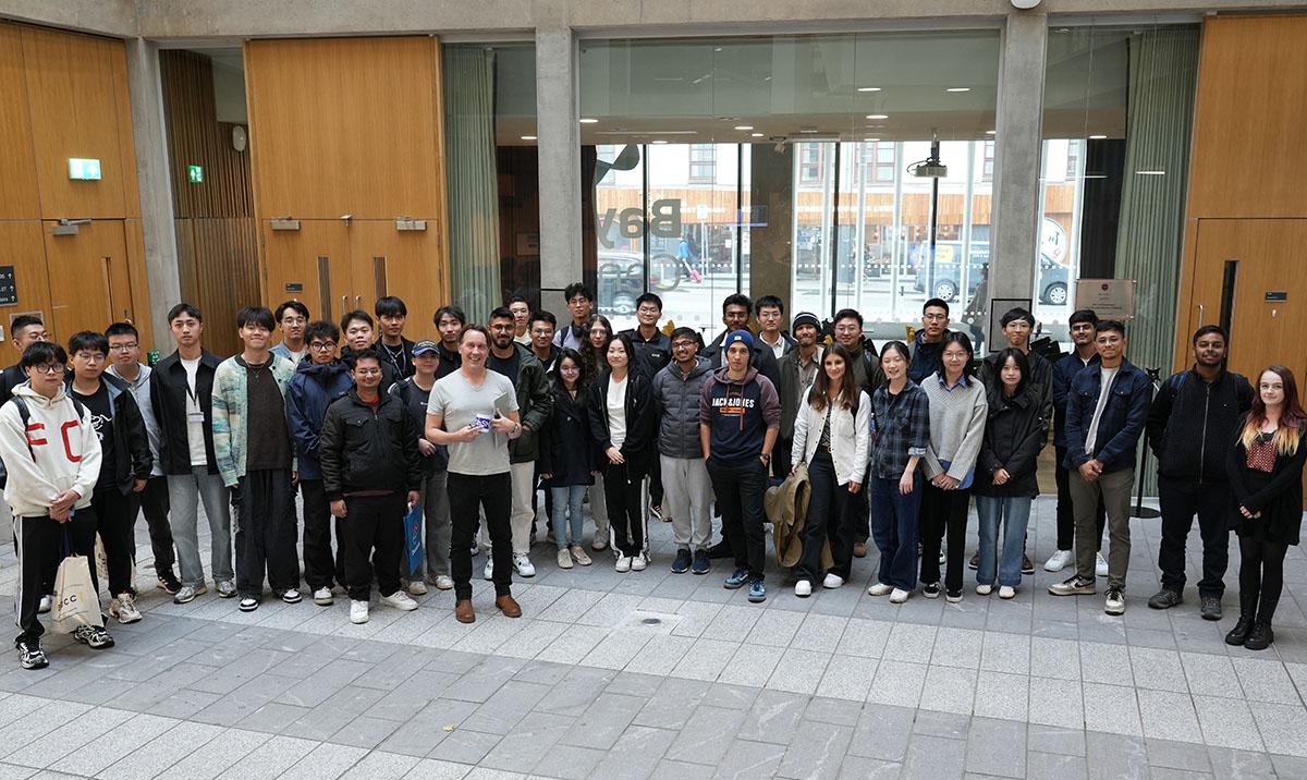 Students at Welcome Week reception in Bayes Centre.