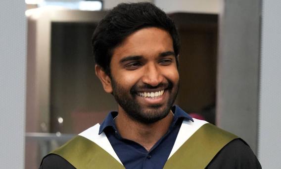 Jaffery Irudayasamy in graduation robe