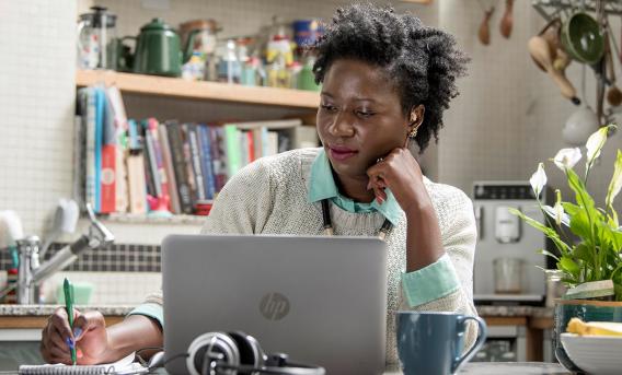 Woman working on a laptop. Image by Douglas Robertson.