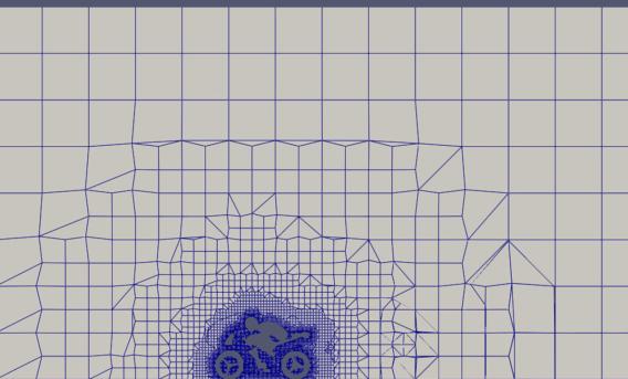 Computer-generated image. Shows person on motorbike rendered as on-refined mesh slice.