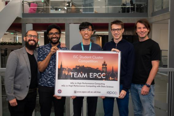 TeamEPCC: 5 young men holding TeamEPCC poster